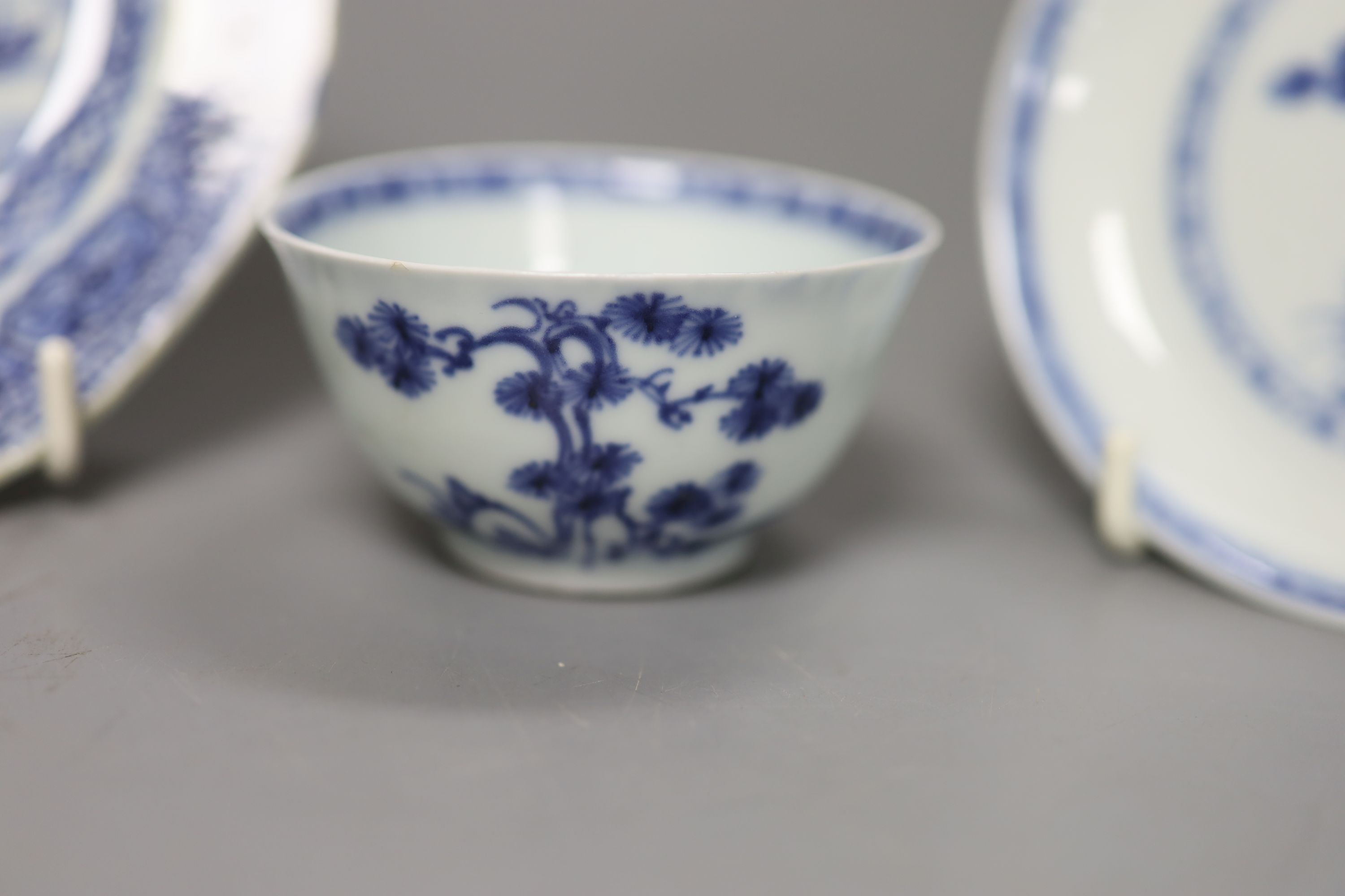 A Chinese 18th century Nanking Cargo blue and white tea bowl and saucer and a small blue and white octagonal plate, W 16cm (plate)